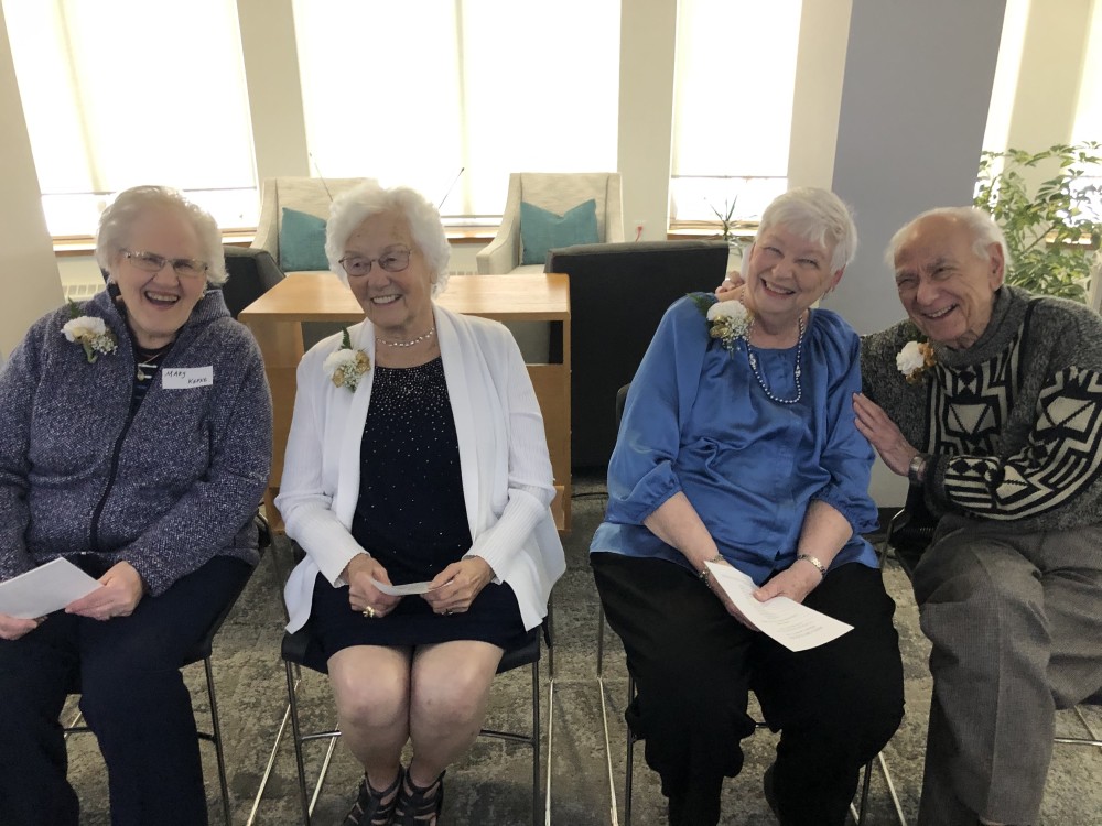 Group image of the four newest member of the "hats off to you" club - the residents who celebrated their 90th birthday that year