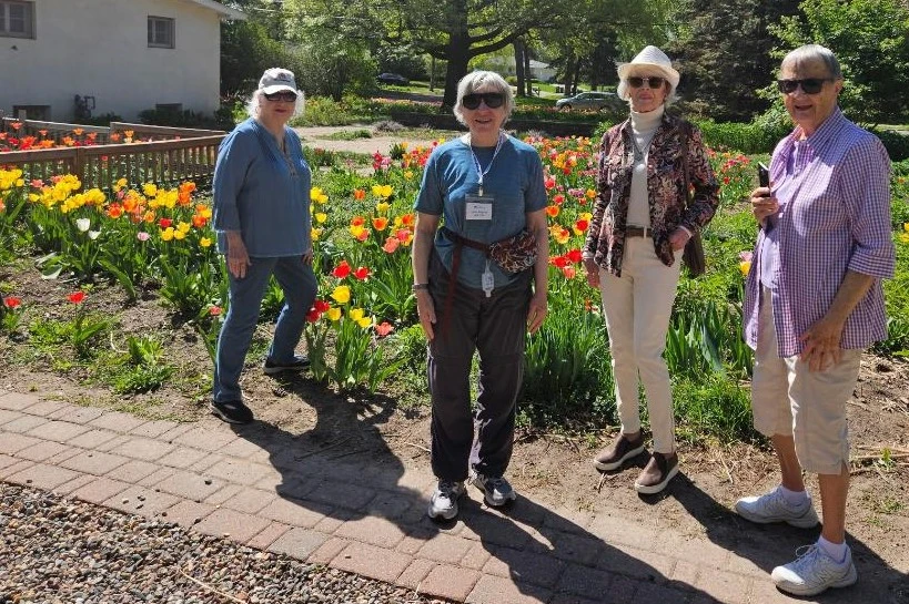 496628820_1184590330346234_415370455998849803_n women walking the grounds at Tulip House